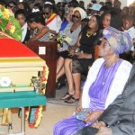 Luciano & his mother at the funeral service for Menelik McClymont