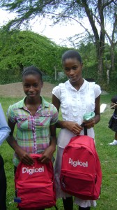 An appreciative duo showing off their Digicel bags