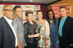 It’s a family affair as the Chin and Cuffe families gather for a moment with the songbird. From left her father-in-law Michael Anthony Cuffe, husband Michael Anthony Cuffe Jr, sister Tami, brother-in-law Wayne and father Richard. Read more: http://www.jamaicaobserver.com/news/Tessanna-says-thanks_15679960#ixzz2oCYcpltA