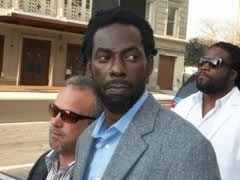 Buju Banton heads to court with long-time friend Gramps Morgan in the background!