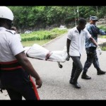 Removing another body from the Rio Cobre River